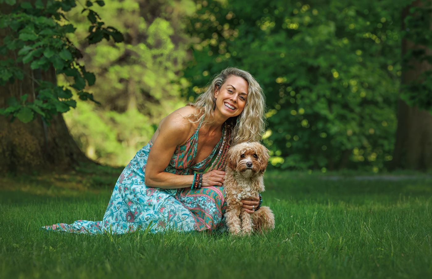 Arianne Missimer and Gracie, her pet dog, hanging out in nature.